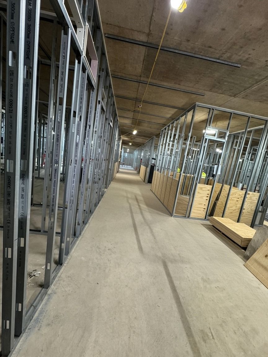 Metal stud partition framing going in