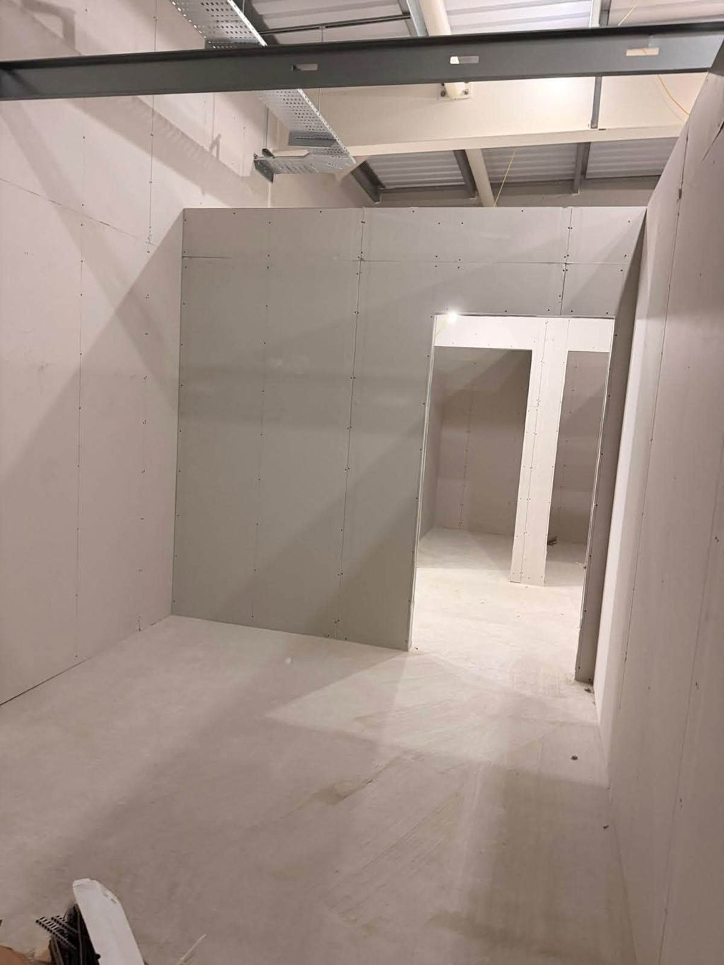 New partitions forming the back-of-house rooms
