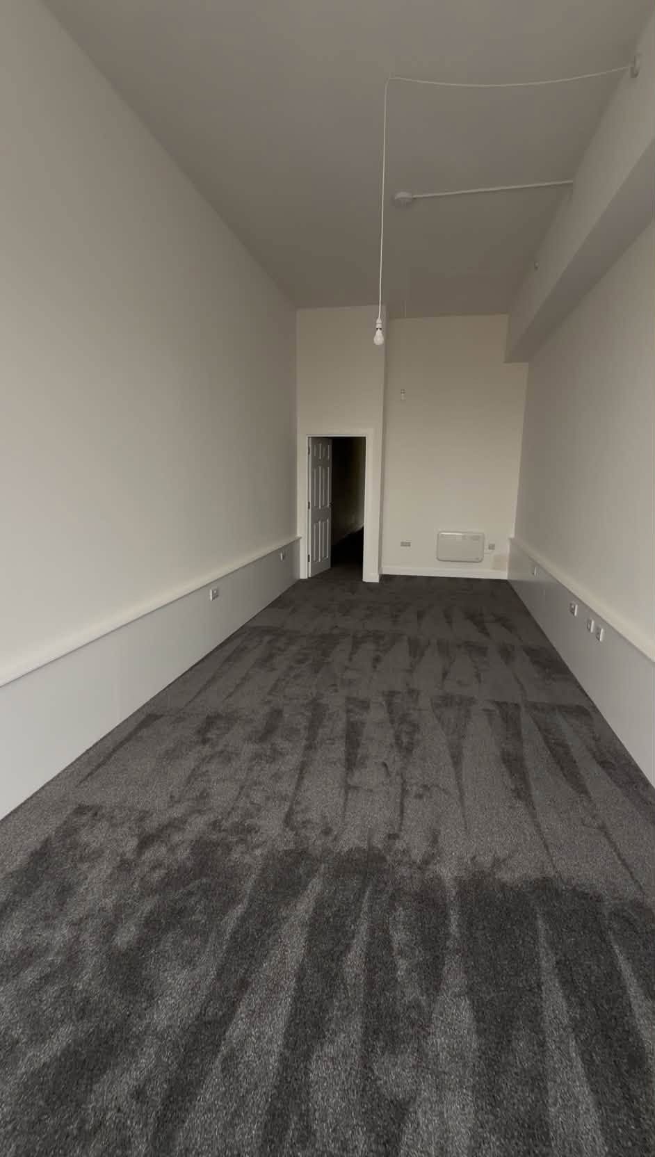 Finished interior with black-framed window